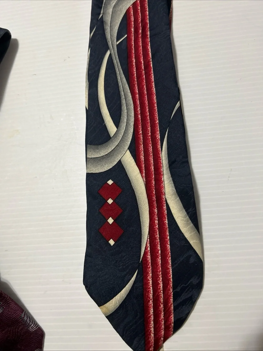 Navy Tie with Red & Cream Wave Detailing - Unbranded